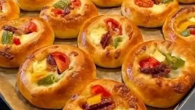 طريقة عمل عجينة البيتزا المظبوطة